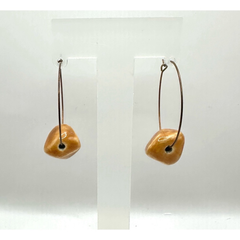 Handcrafted pair of Lightweight hoop earrings, featuring artisan ceramic beads